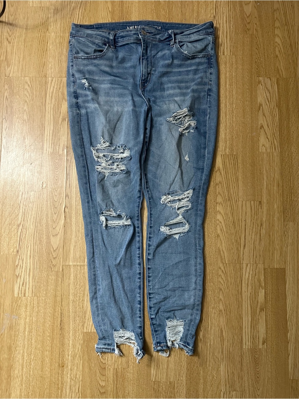 American Eagle High Waisted Distressed Jegging Light Wash Size 16 Regular